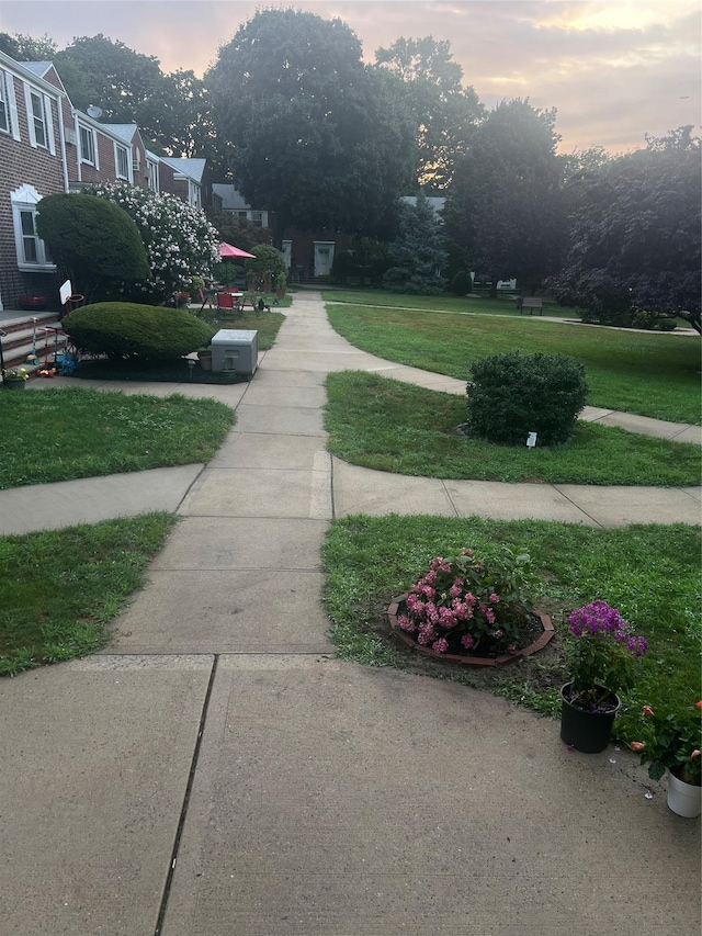 264-31 Langston Ave Fl 2Nd, Glen Oaks, NY 11004 - view of property's community featuring a lawn