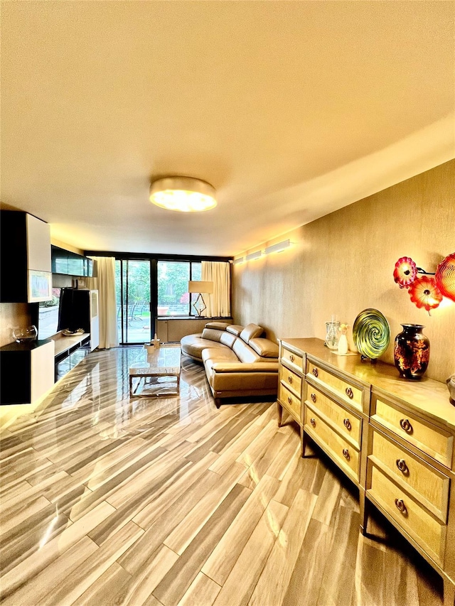 21019 26th Avenue Tl, Bayside, NY 11360 - living area with light wood-style flooring and a textured ceiling