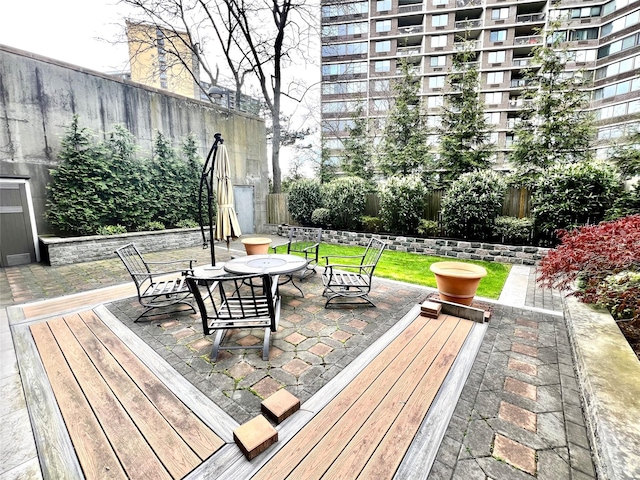 21019 26th Avenue Tl, Bayside, NY 11360 - deck featuring a fenced backyard, outdoor dining space, and a patio area