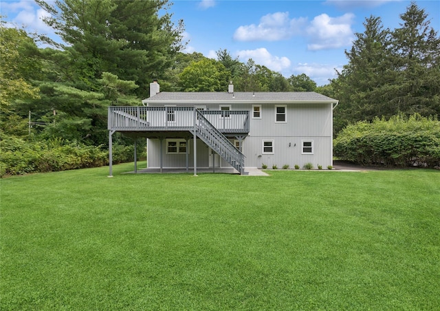 297 Farm To Market Rd, Brewster, NY 10509 - back of property featuring stairs, a deck, and a yard