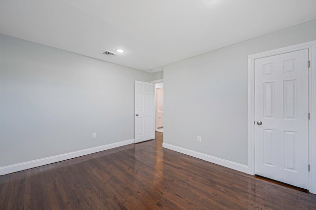 248 E Shore Rd, Lindenhurst, NY 11757 - spare room with dark wood-style floors and recessed lighting