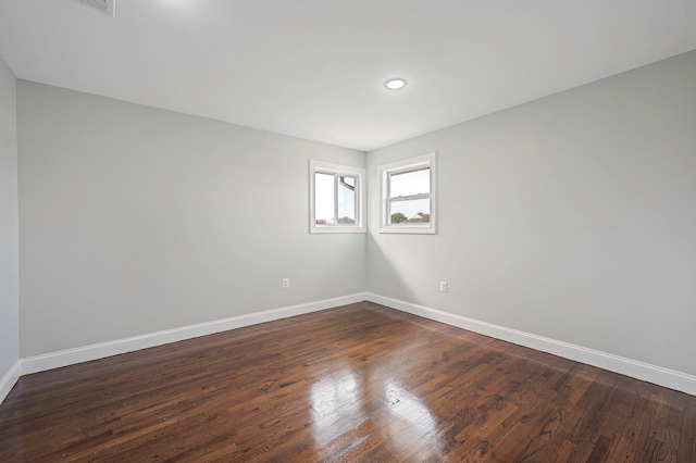 248 E Shore Rd, Lindenhurst, NY 11757 - empty room with dark wood finished floors and recessed lighting