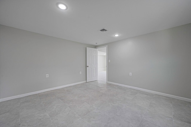 248 E Shore Rd, Lindenhurst, NY 11757 - spare room with recessed lighting and baseboards
