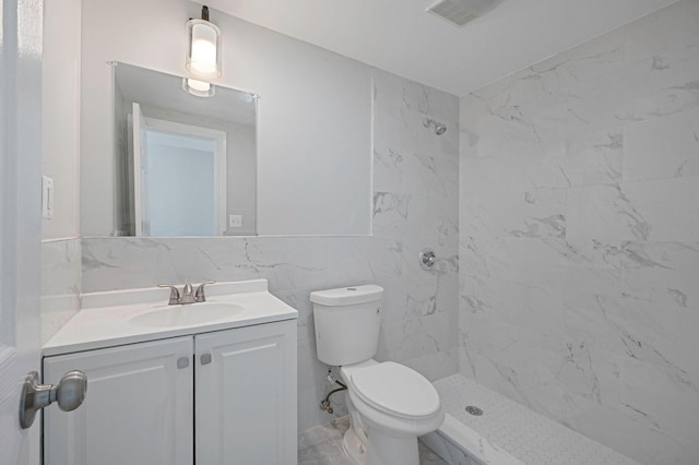248 E Shore Rd, Lindenhurst, NY 11757 - bathroom with a marble finish shower, vanity, and tile walls
