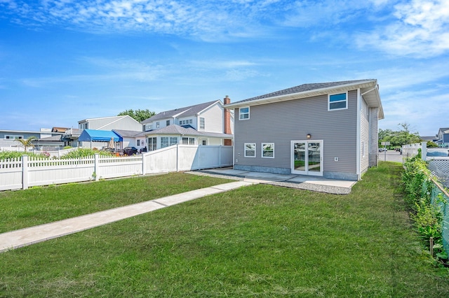 248 E Shore Rd, Lindenhurst, NY 11757 - back of house featuring a patio area and a fenced backyard