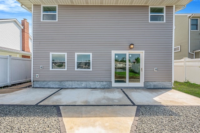 248 E Shore Rd, Lindenhurst, NY 11757 - back of property featuring a patio