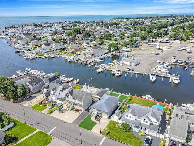 248 E Shore Rd, Lindenhurst, NY 11757 - aerial perspective of suburban area with a nearby body of water and a marina