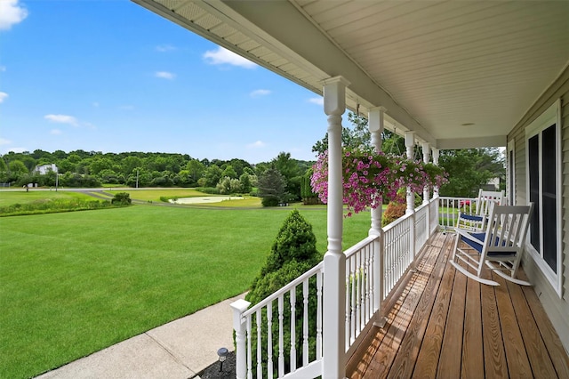 106 Maple Ave, Goshen, NY 10924 - porch featuring a yard and view of wooded area