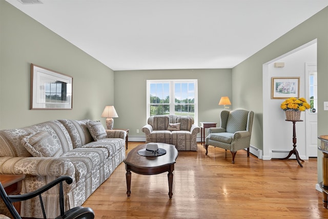 106 Maple Ave, Goshen, NY 10924 - living area featuring light wood-type flooring and baseboard heating