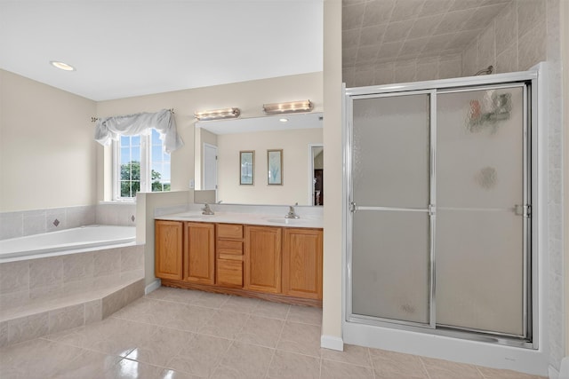 106 Maple Ave, Goshen, NY 10924 - full bath with a shower stall, tile patterned floors, double vanity, a bath, and recessed lighting