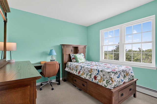 106 Maple Ave, Goshen, NY 10924 - bedroom with light colored carpet, a baseboard radiator, and an office area