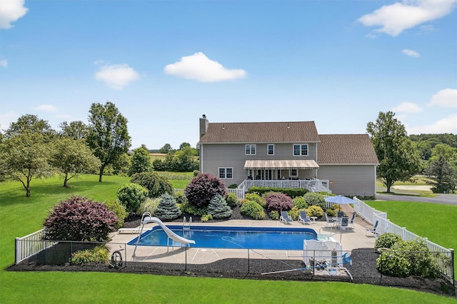 106 Maple Ave, Goshen, NY 10924 - view of swimming pool with a water slide, a fenced backyard, and a patio