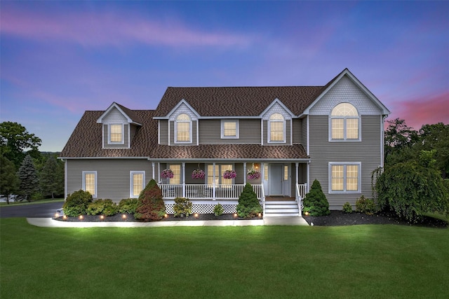 106 Maple Ave, Goshen, NY 10924 - view of front facade with covered porch, a lawn, and roof with shingles
