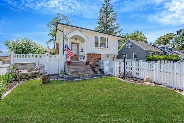 511 N Delaware Ave, Lindenhurst, NY 11757 - raised ranch with a garage, brick siding, and a gate