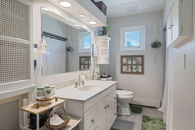 511 N Delaware Ave, Lindenhurst, NY 11757 - full bathroom featuring baseboard heating, vanity, tile patterned floors, and a shower with curtain