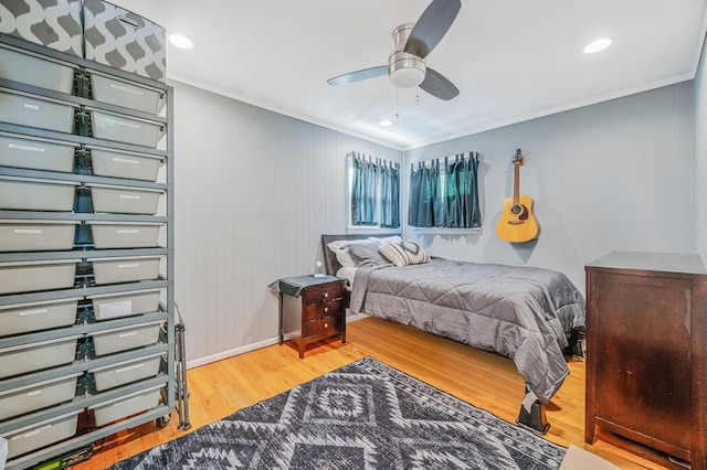 511 N Delaware Ave, Lindenhurst, NY 11757 - bedroom with wood finished floors, ornamental molding, and a ceiling fan