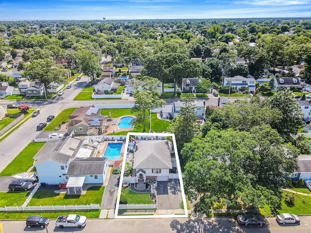 511 N Delaware Ave, Lindenhurst, NY 11757 - aerial view of residential area with property boundaries highlighted and a pool