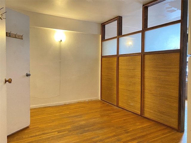 13705 Franklin Ave Unit 6L, Flushing, NY 11355 - unfurnished bedroom with wood finished floors