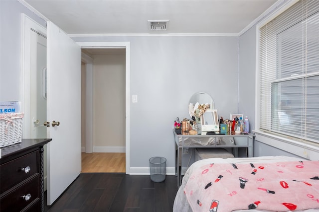 414 Pecan St, Lindenhurst, NY 11757 - bedroom with dark wood-type flooring, crown molding, and multiple windows