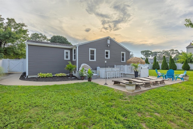 414 Pecan St, Lindenhurst, NY 11757 - rear view of property with a gate and a patio area