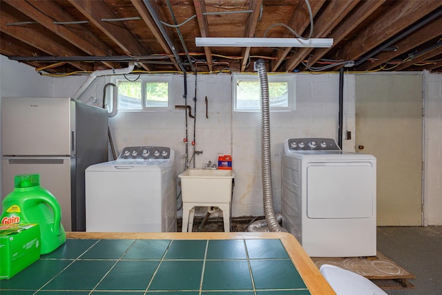 18 Alexander Blvd, Poughkeepsie, NY 12603 - washroom featuring separate washer and dryer and healthy amount of natural light