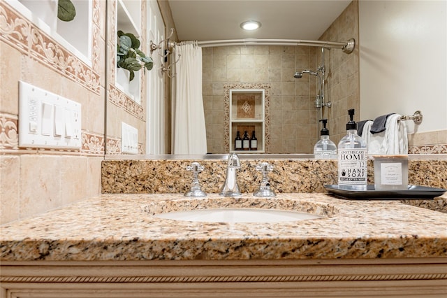 27 Maple Rd, Lake Peekskill, NY 10537 - bathroom featuring vanity, tiled shower, recessed lighting, and decorative backsplash