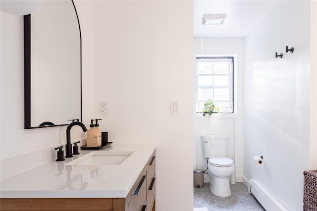 27 Maple Rd, Lake Peekskill, NY 10537 - bathroom with a baseboard radiator, vanity, and speckled floor