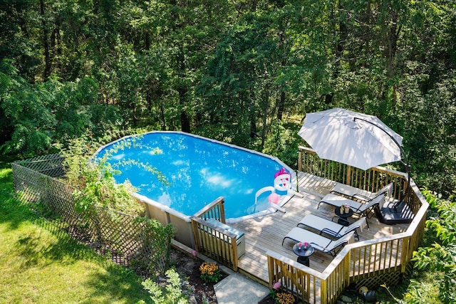 27 Maple Rd, Lake Peekskill, NY 10537 - view of pool with a wooden deck and a forest view