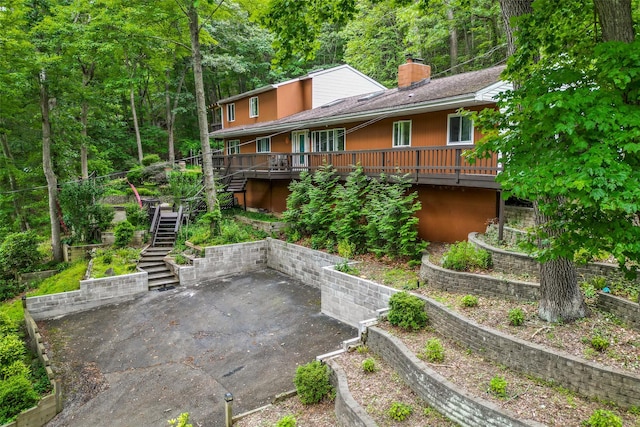 485 Harbor Rd, Cold Spring Harbor, NY 11724 - view of patio featuring stairway, a deck, and a view of trees