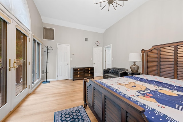 485 Harbor Rd, Cold Spring Harbor, NY 11724 - bedroom with high vaulted ceiling, access to outside, light wood-style flooring, and a chandelier