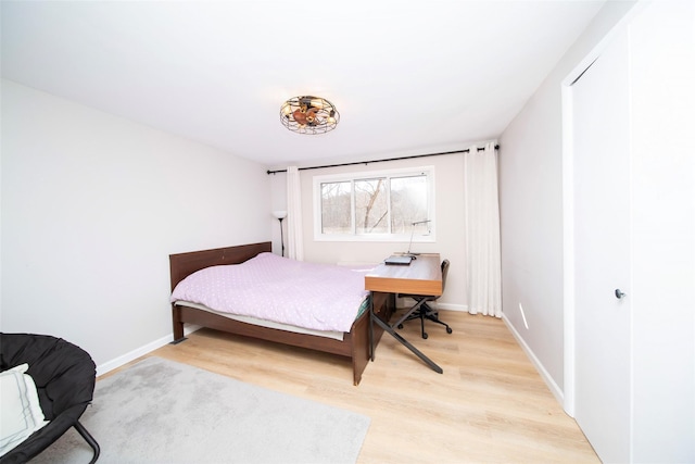 485 Harbor Rd, Cold Spring Harbor, NY 11724 - bedroom with light wood-style floors and baseboards