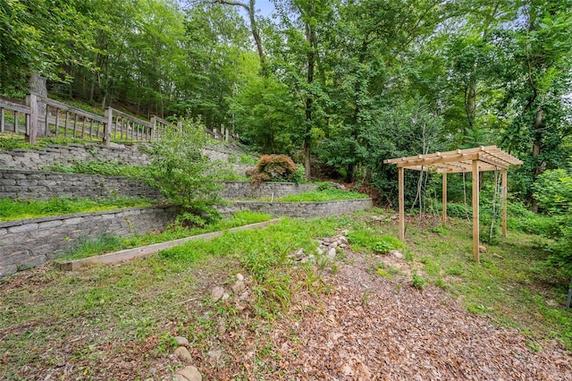 485 Harbor Rd, Cold Spring Harbor, NY 11724 - view of yard with a pergola and a view of trees