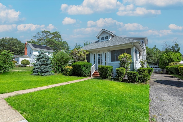 2 Florence St, North Baldwin, NY 11510 - bungalow-style home featuring roof with shingles and driveway