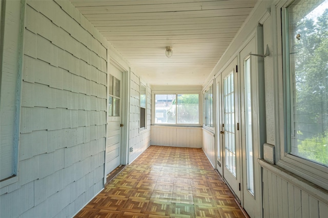 2 Florence St, North Baldwin, NY 11510 - unfurnished sunroom featuring wooden walls and wooden ceiling