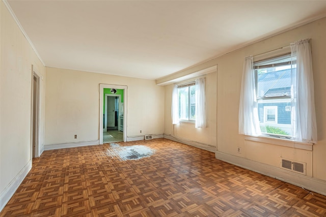 2 Florence St, North Baldwin, NY 11510 - spare room featuring baseboards and crown molding