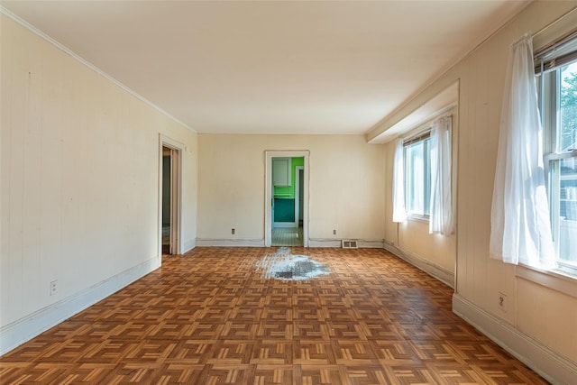 2 Florence St, North Baldwin, NY 11510 - spare room featuring healthy amount of natural light and ornamental molding