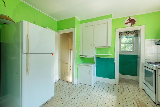2 Florence St, North Baldwin, NY 11510 - kitchen with white appliances, light flooring, ornamental molding, and white cabinetry
