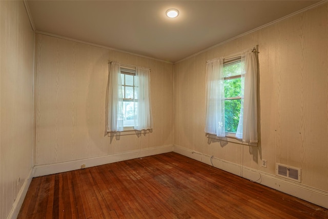 2 Florence St, North Baldwin, NY 11510 - spare room featuring wood-type flooring and crown molding