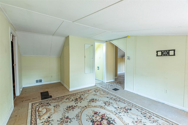 2 Florence St, North Baldwin, NY 11510 - bonus room featuring lofted ceiling and baseboards
