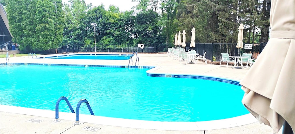 1807 Holly Walk, Poughkeepsie, NY 12603 - community pool with a patio and view of scattered trees