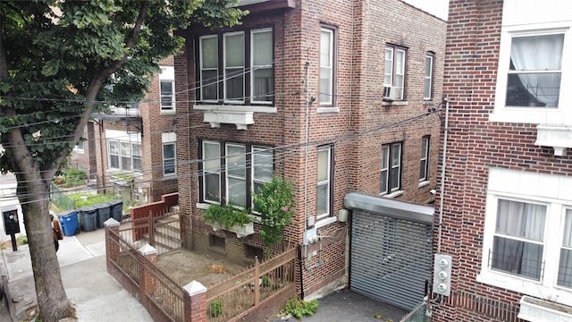 1860 Harrison Ave, Bronx, NY 10453 - view of property exterior featuring brick siding and cooling unit