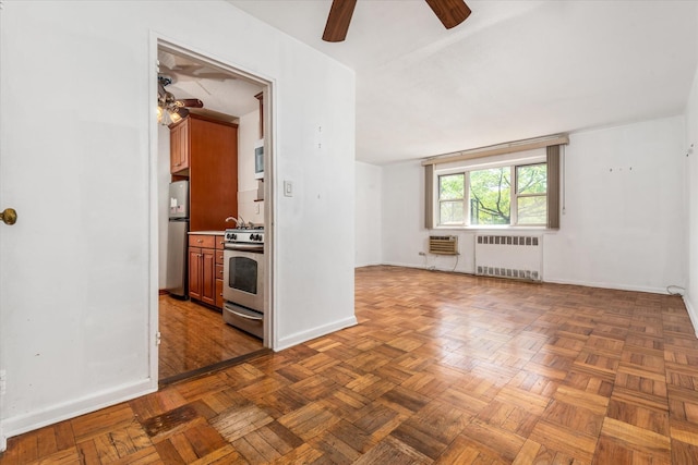 89-40 151st Ave Unit 1M, Howard Beach, NY 11414 - spare room with radiator heating unit and ceiling fan