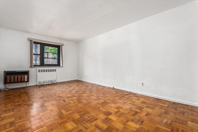 89-40 151st Ave Unit 1M, Howard Beach, NY 11414 - unfurnished living room with radiator heating unit and heating unit