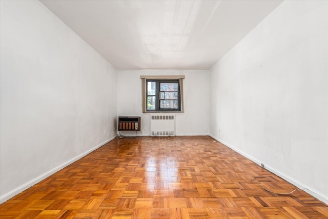 89-40 151st Ave Unit 1M, Howard Beach, NY 11414 - unfurnished room with radiator and heating unit
