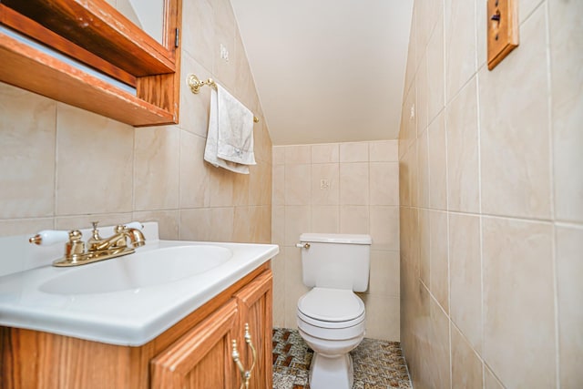 127 Keating Pl, Staten Island, NY 10314 - half bath with vanity, tile walls, and lofted ceiling