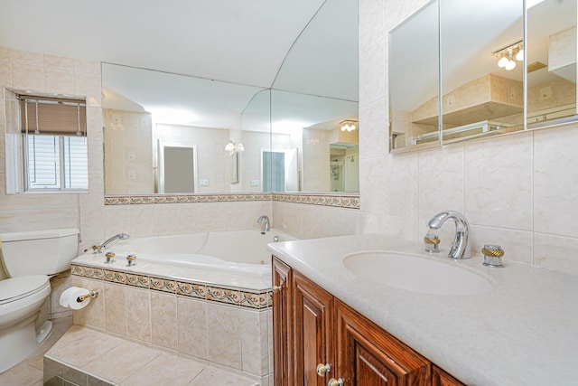 127 Keating Pl, Staten Island, NY 10314 - bathroom featuring tile walls, a garden tub, vanity, and tile patterned flooring