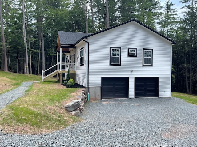 109 Krystyna Rd, White Lake, NY 12787 - view of side of home with an attached garage and driveway