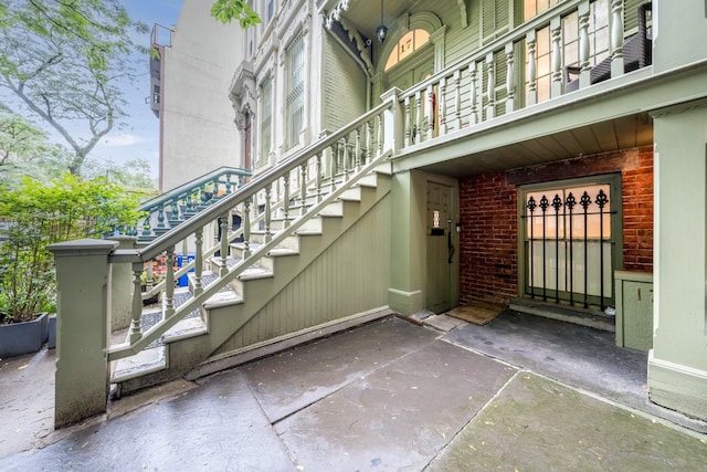 17E 128th St, New York Manhattan, NY 10035 - view of exterior entry with brick siding and a balcony