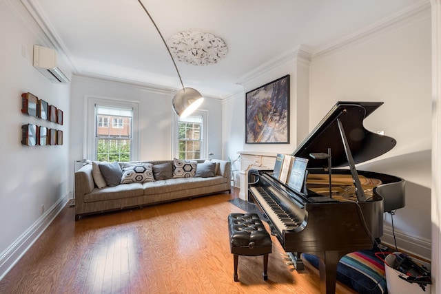 17E 128th St, New York Manhattan, NY 10035 - sitting room featuring an AC wall unit, ornamental molding, and wood finished floors