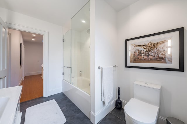 17E 128th St, New York Manhattan, NY 10035 - full bathroom with vanity, bath / shower combo with glass door, recessed lighting, and tile patterned floors